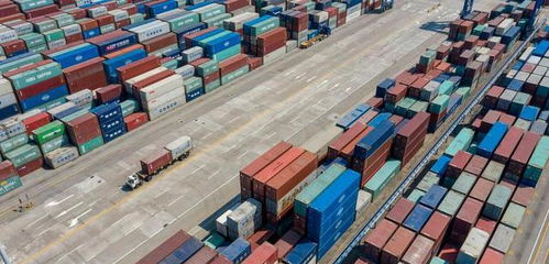 中國再創(chuàng)外貿(mào)新紀錄 2021年貨物進出口規(guī)模突破6萬億美元，成為全球經(jīng)濟復蘇的強勁引擎
